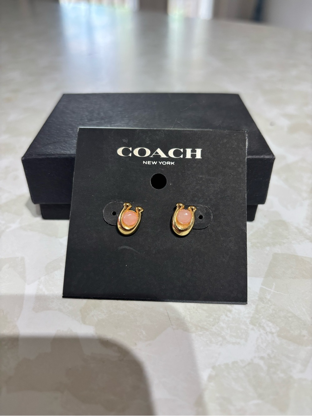 Coach Gold-Tone Earrings with Pink Cabochon
